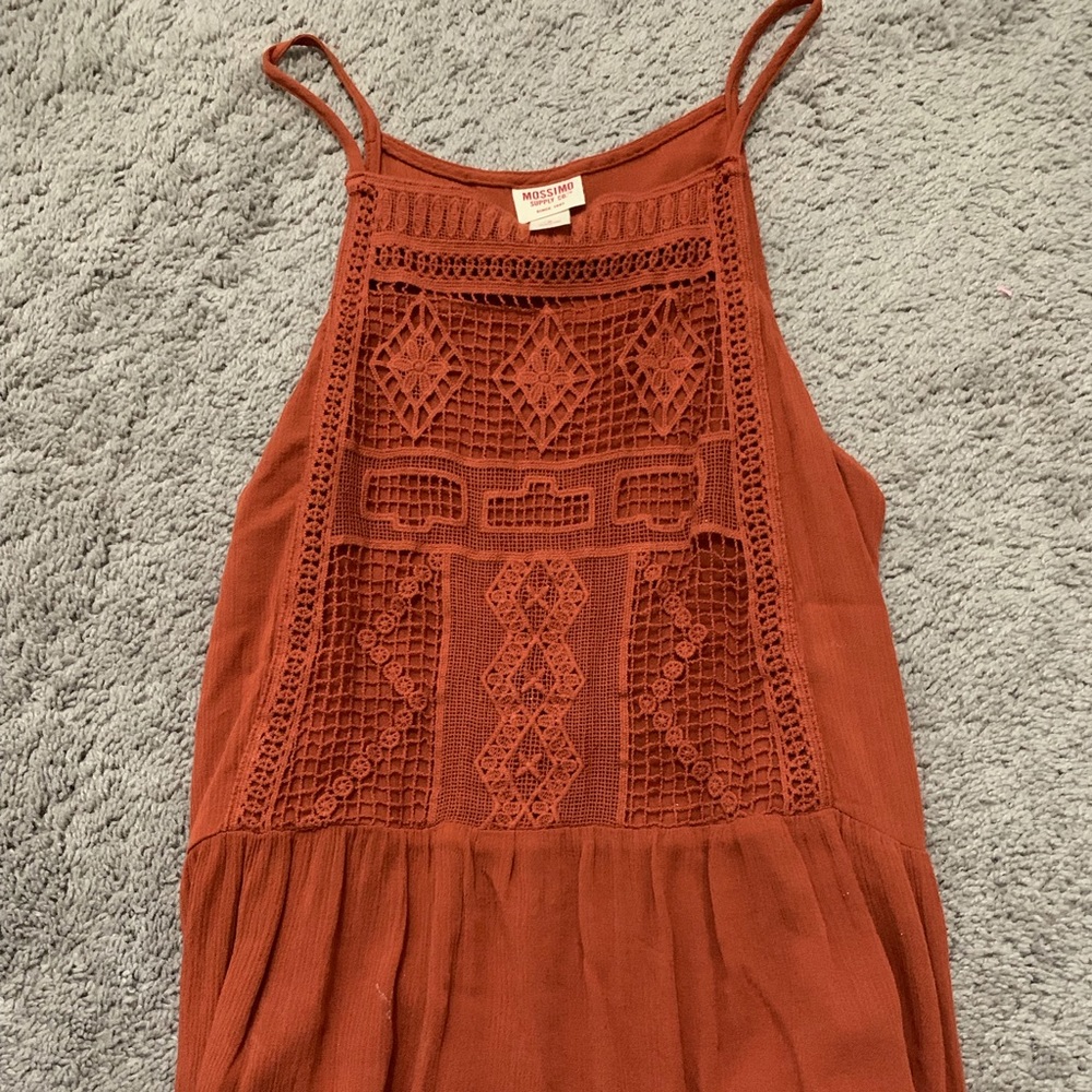 A flowy  orange halter top
